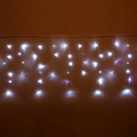 Гирлянда эл.д/улицы занавес Бахрома 3*0,4/0,6м 100LED "Мерцание" цв.белый (св.провод) 1реж IP-54 арт.183-289